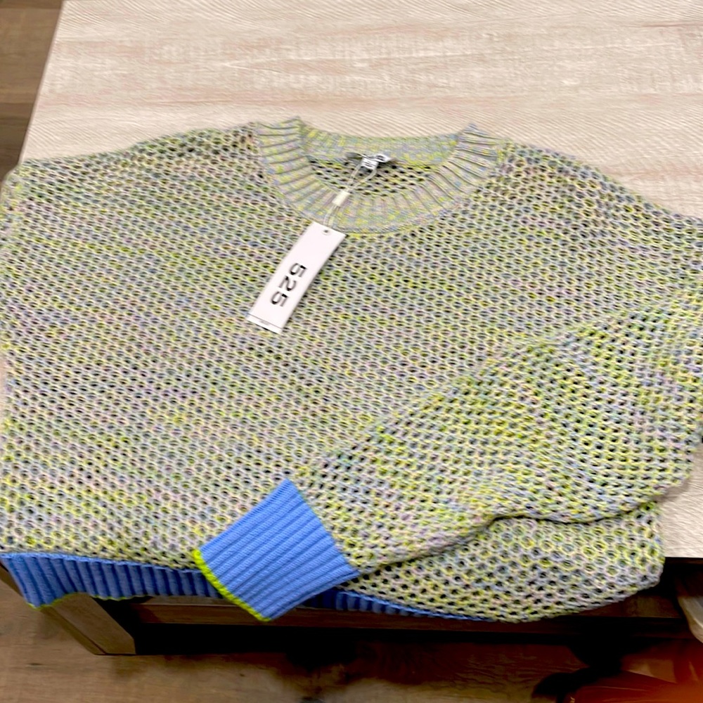 Brand new never used. Beautiful sweater.